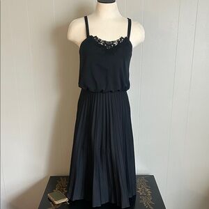 Vintage black sundress with lace on the bodice adjustable straps  pleated skirt